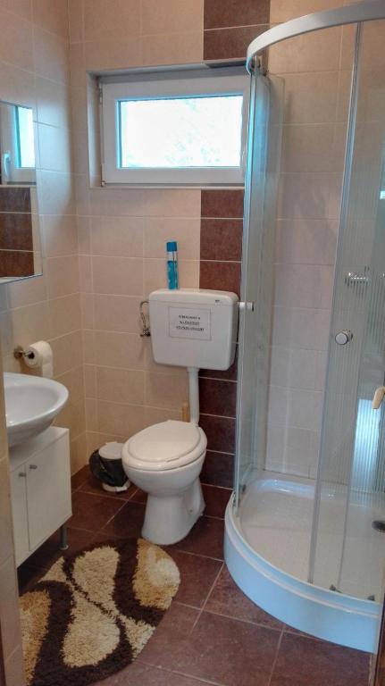 Kúpeľňa v ubytovaní Sunshine apartman