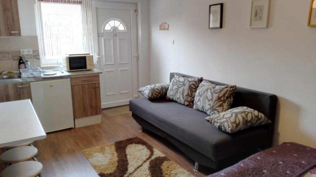 Kuchyňa alebo kuchynka v ubytovaní Sunshine apartman