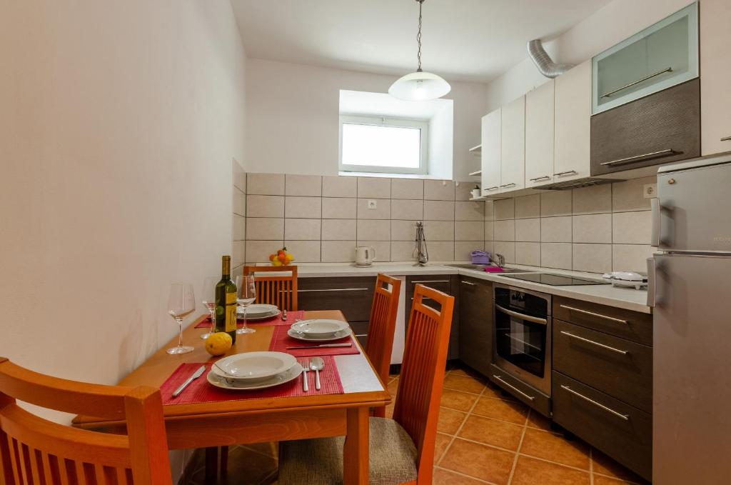 Kuchyň nebo kuchyňský kout v ubytování House Lara