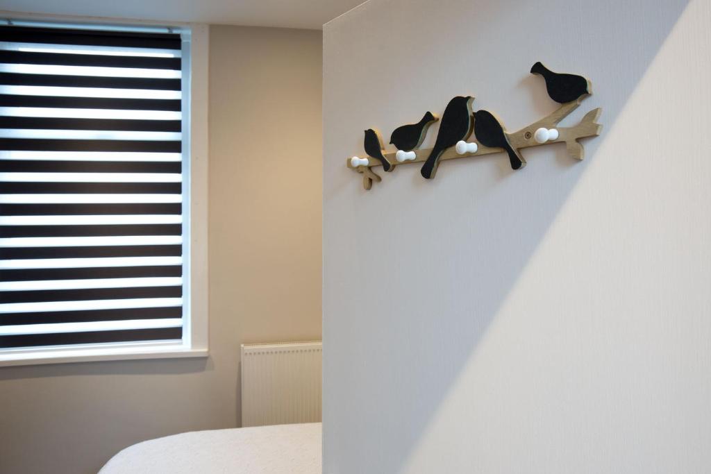 Postel nebo postele na pokoji v ubytování Blackbird Luxury Apartments Room 1