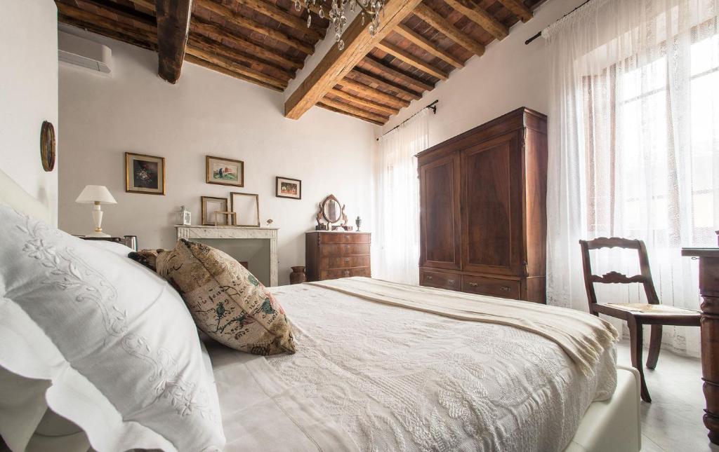 Postel nebo postele na pokoji v ubytování A casa di Irma e Nilo