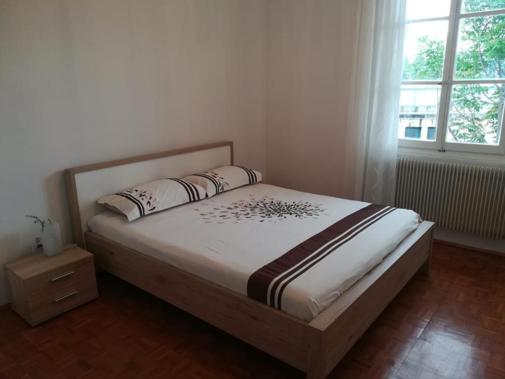 Кровать или кровати в номере B&B Stadio Apartment