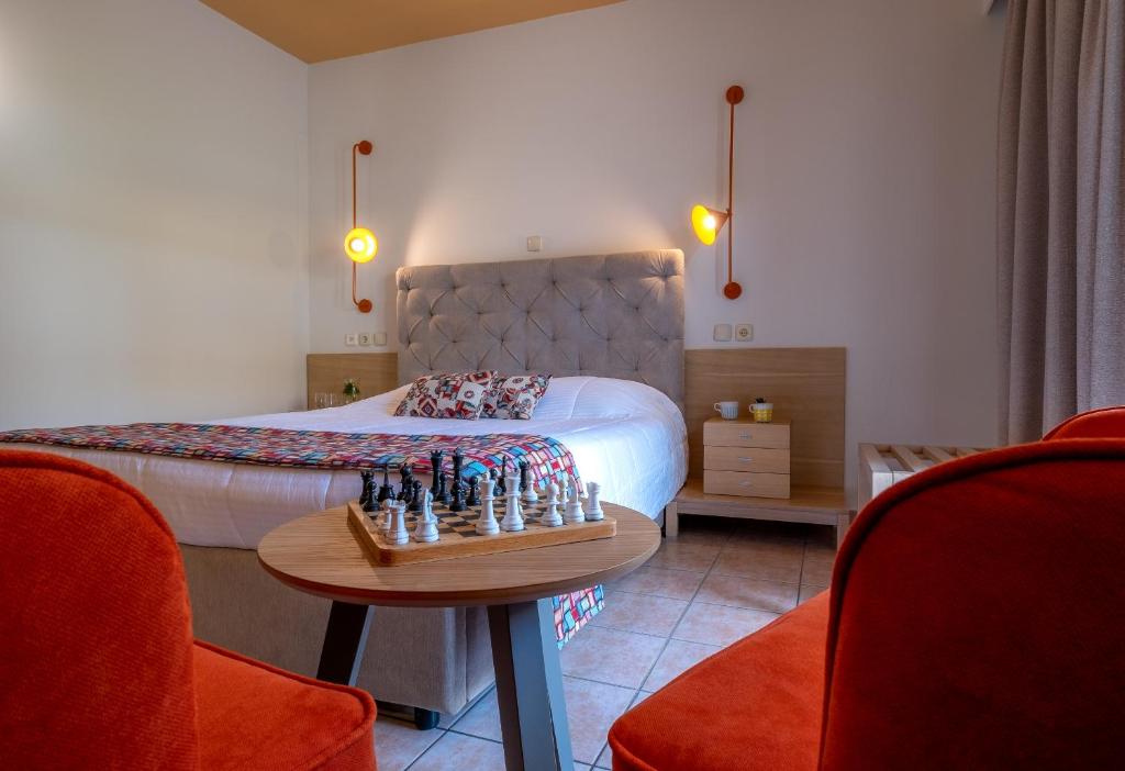 Posezení v ubytování Flisvos Royal Hotel & Suites