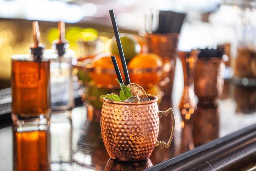 a drink in a copper cup on a bar at Grupotel Parc Natural & Spa in Playa de Muro