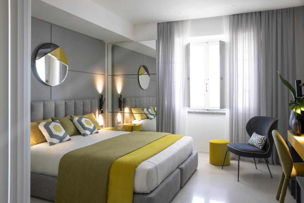 Postel nebo postele na pokoji v ubytování Hotel Plaza e de Russie - Relais & Châteaux