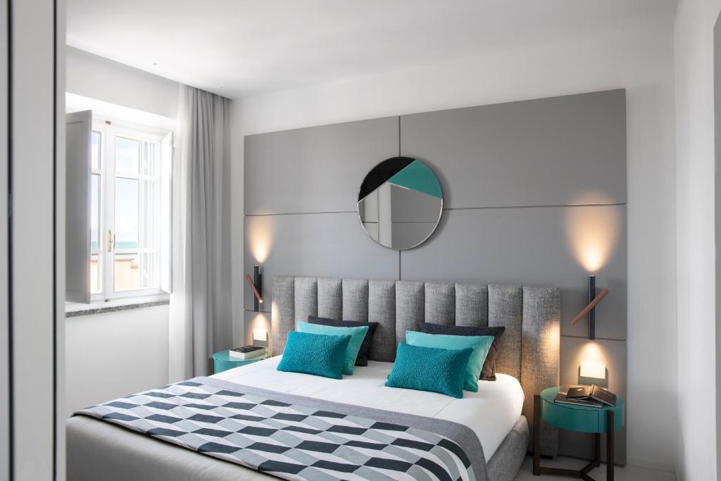 Postel nebo postele na pokoji v ubytování Hotel Plaza e de Russie - Relais & Châteaux