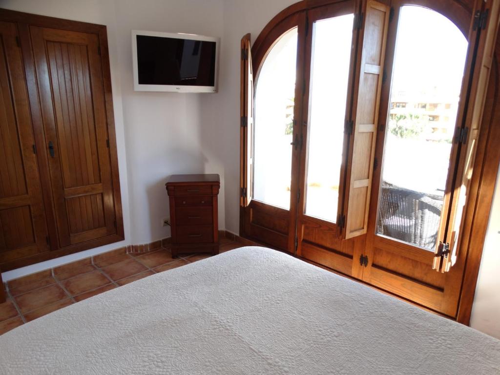 Posteľ alebo postele v izbe v ubytovaní Apartamento Panorama View, Panorama Park, Punta Prima, Torrevieja