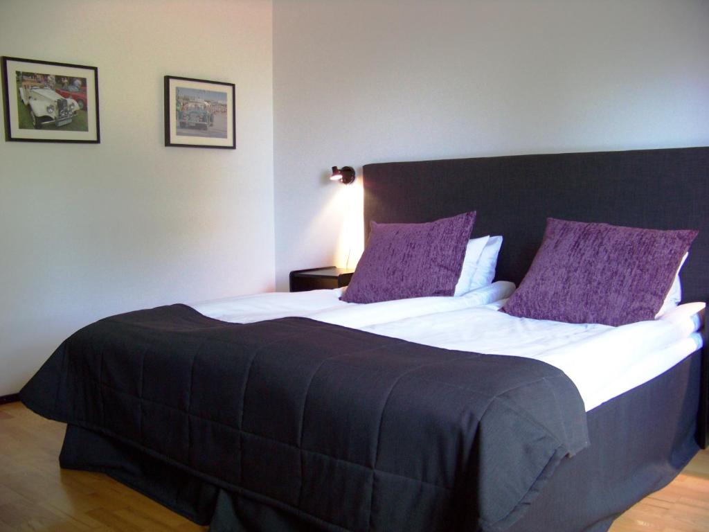Postel nebo postele na pokoji v ubytování Hotel Bellevue