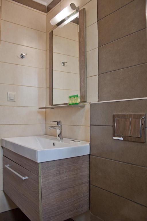 Koupelna v ubytování Danaos Hotel