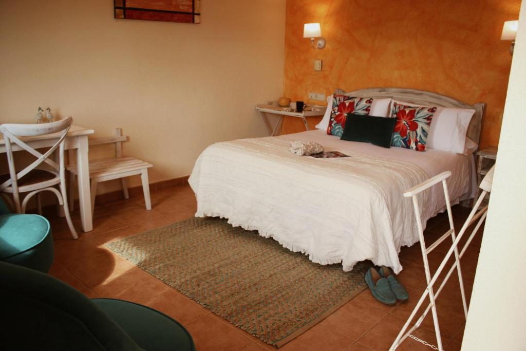 Posteľ alebo postele v izbe v ubytovaní Hotel Sant Joan