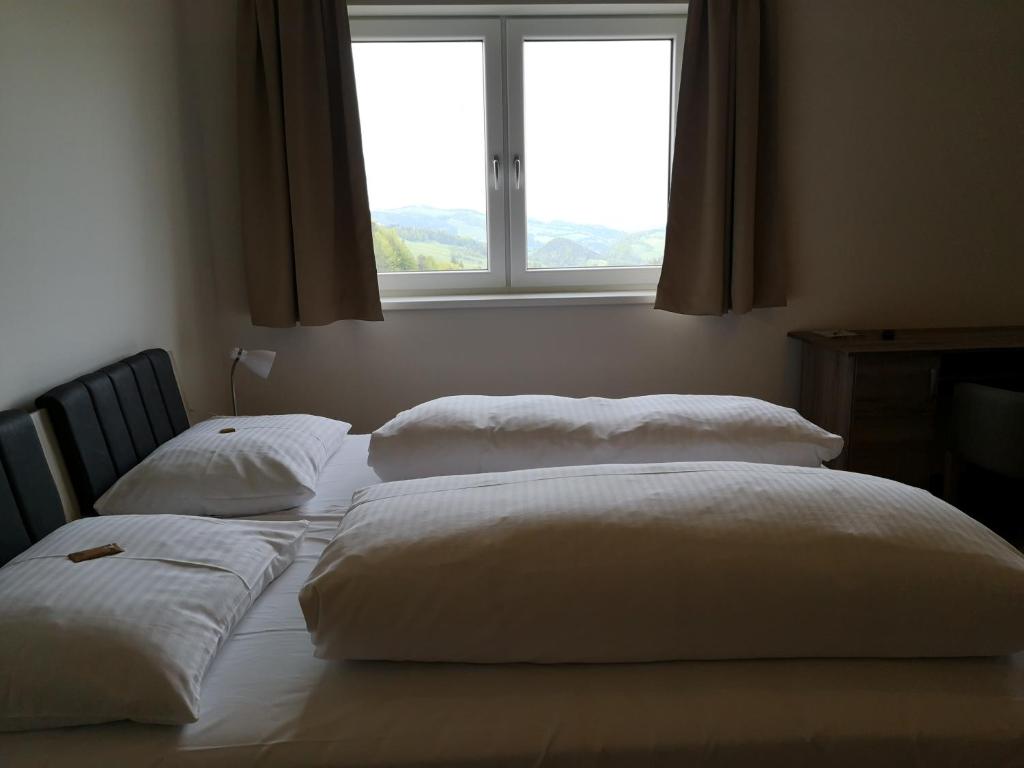 Postel nebo postele na pokoji v ubytování Hotel Restaurant Winterbach