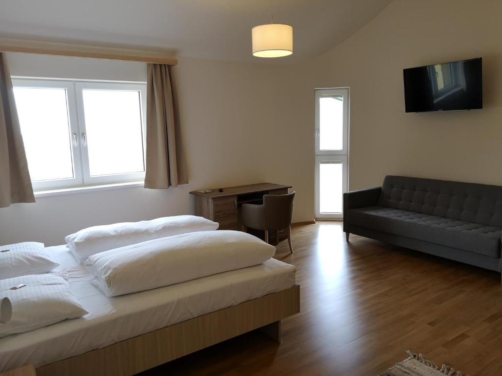 Postel nebo postele na pokoji v ubytování Hotel Restaurant Winterbach