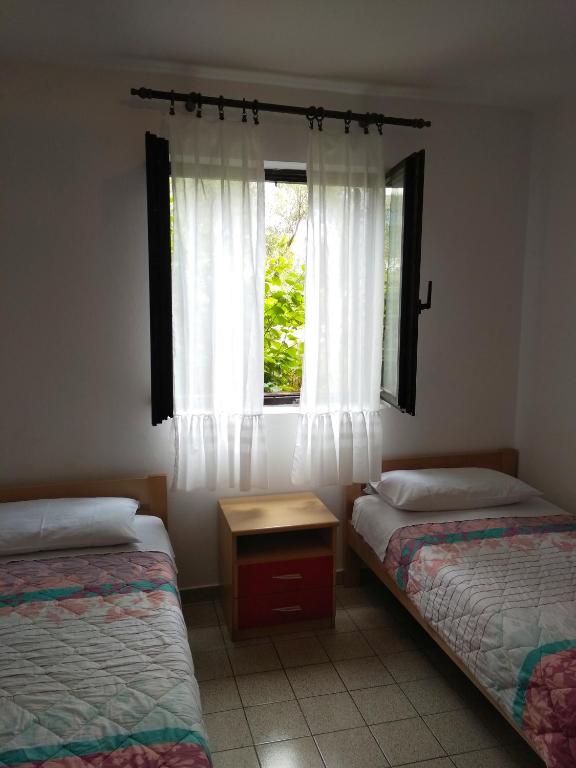 Posteľ alebo postele v izbe v ubytovaní Apartment Ana M