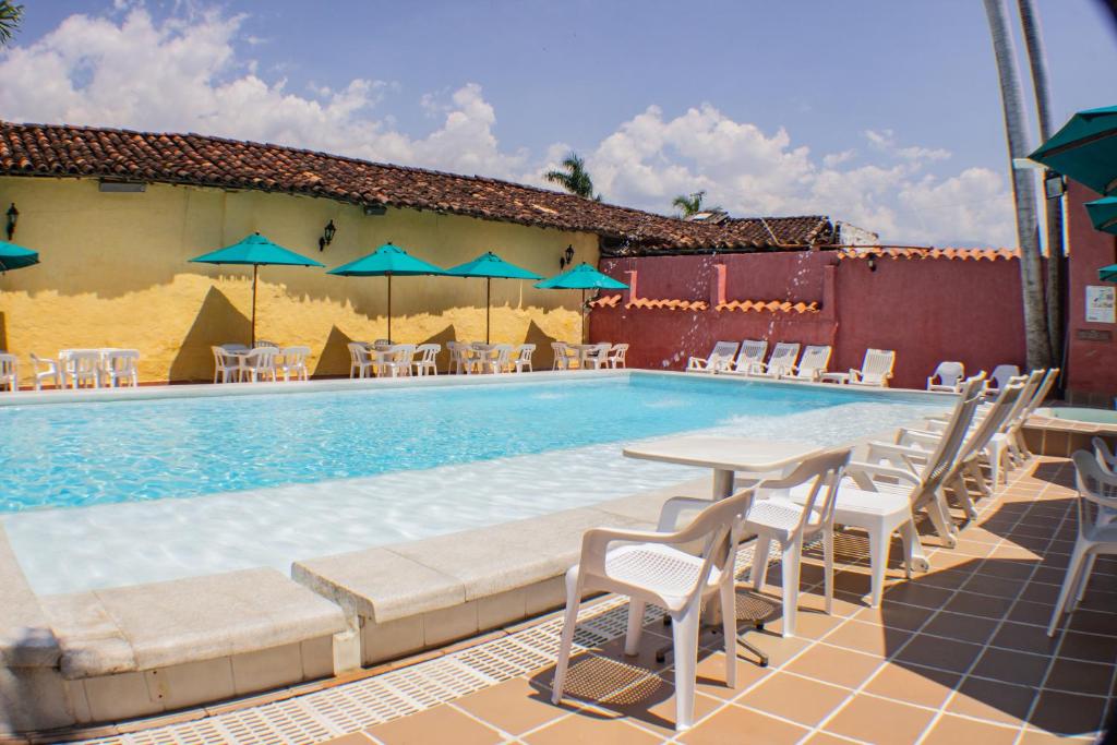 Bazén v ubytování Casa Hotel Guaracú nebo v jeho okolí