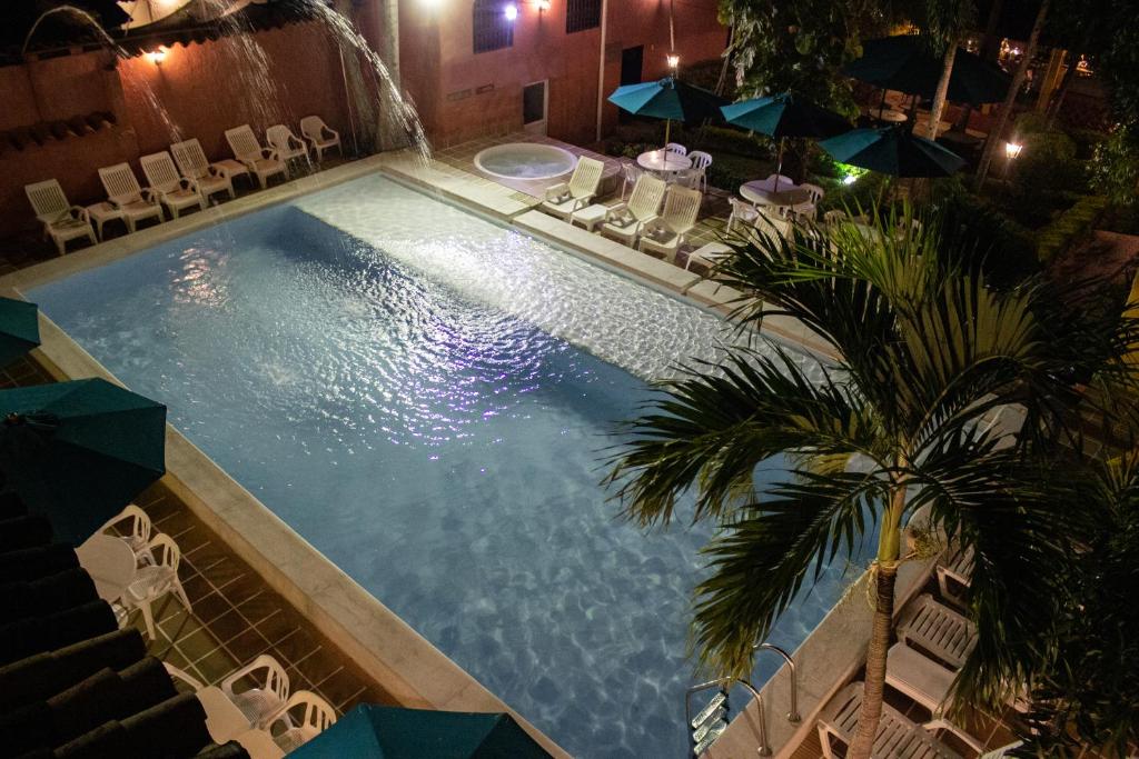 Bazén v ubytování Casa Hotel Guaracú nebo v jeho okolí