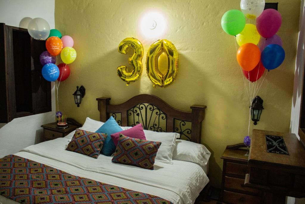 Postel nebo postele na pokoji v ubytování Casa Hotel Guaracú