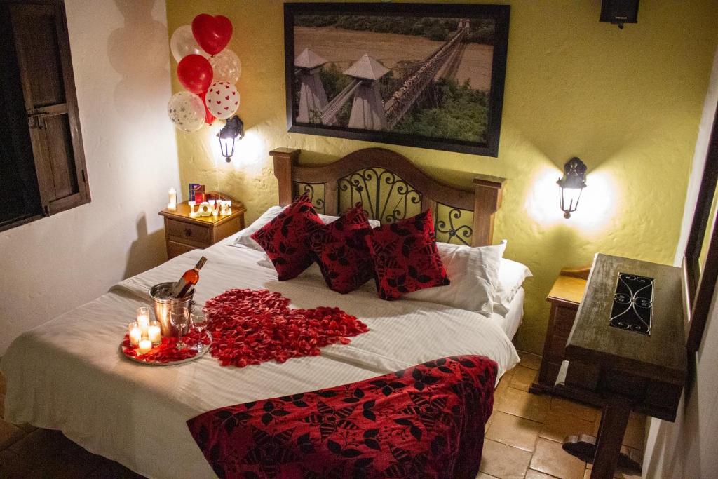 Postel nebo postele na pokoji v ubytování Casa Hotel Guaracú