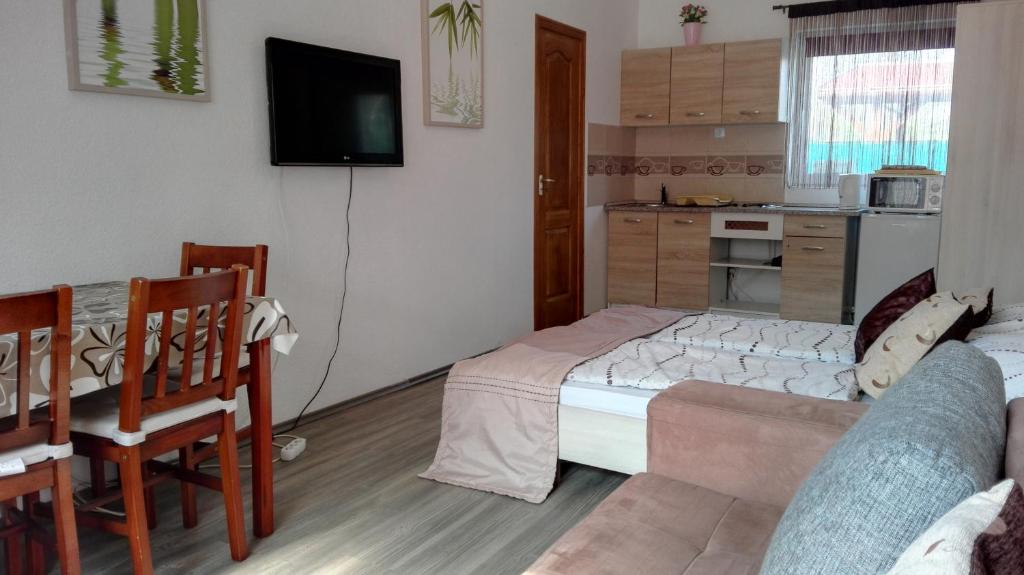 Kuchyňa alebo kuchynka v ubytovaní Sunshine apartman