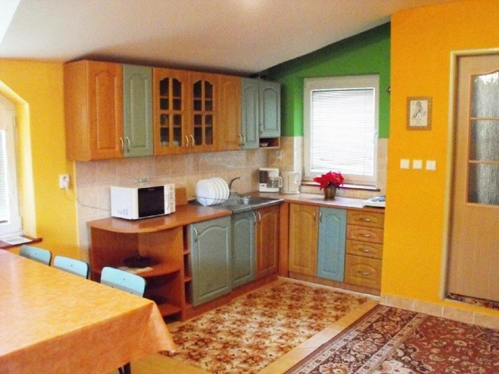 A kitchen or kitchenette at Penzión Bajo