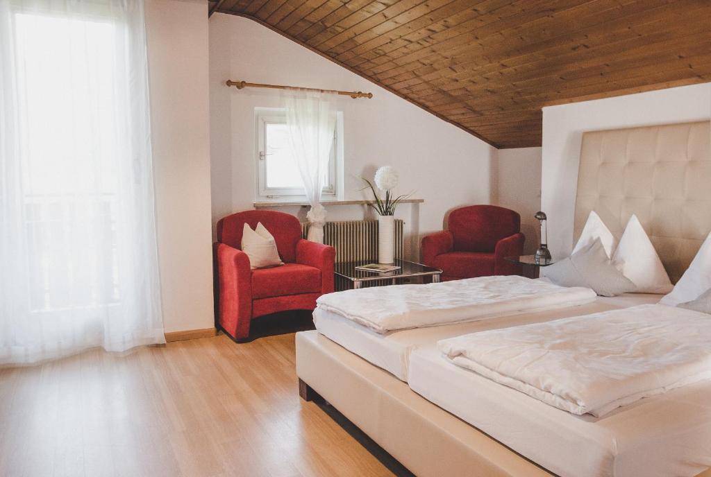 Postel nebo postele na pokoji v ubytování Guesthouse Christine
