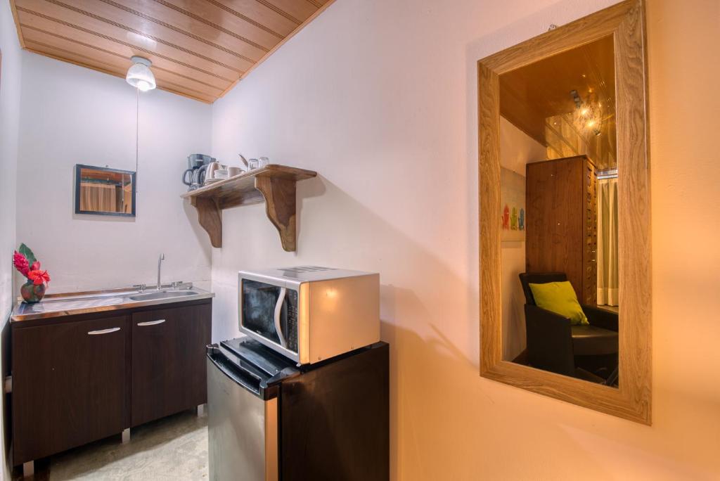 TV a/nebo společenská místnost v ubytování CariPro Apartments
