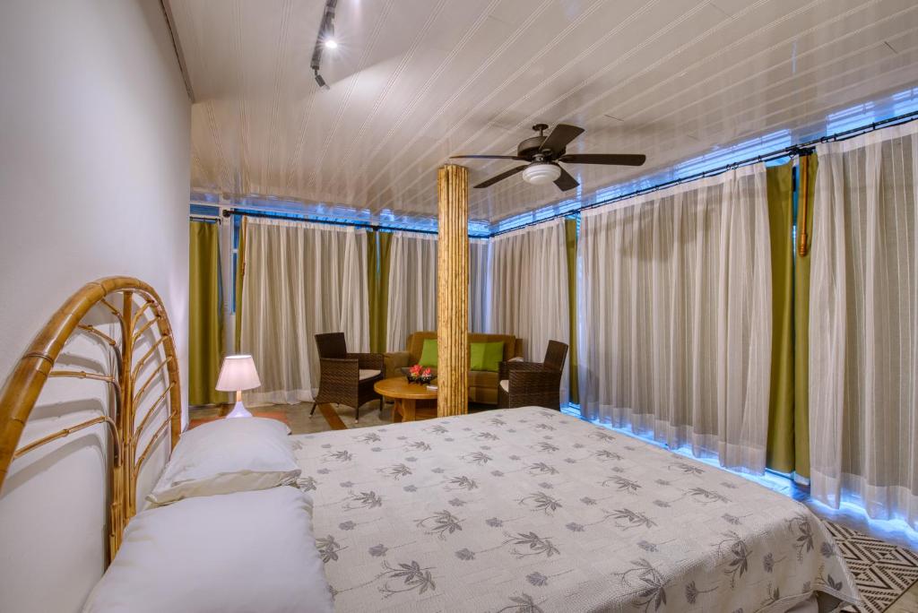 Postel nebo postele na pokoji v ubytování CariPro Apartments