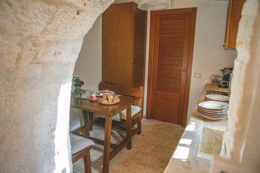 Część wypoczynkowa w obiekcie Trullo Grace -Trulli Anti' Charme & Relax