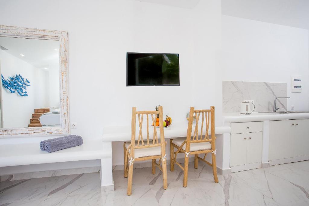 Kuchyňa alebo kuchynka v ubytovaní Ammos Luxury Suites