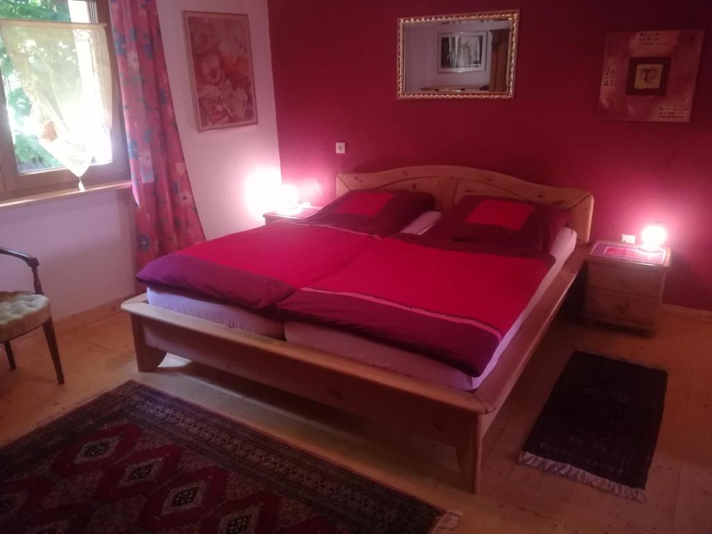 Katil atau katil-katil dalam bilik di Ferienhaus Nostalgie