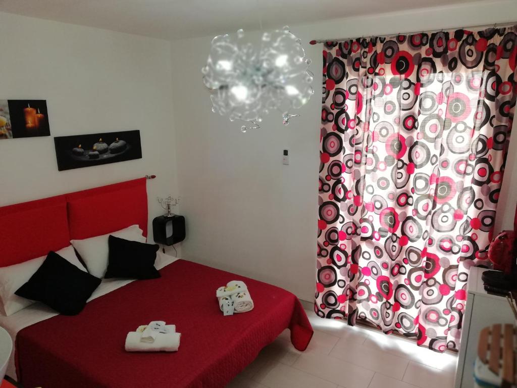 Postel nebo postele na pokoji v ubytování B&B Extremo Sud