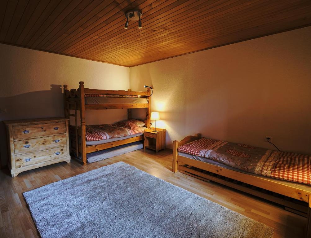 Postel nebo postele na pokoji v ubytování Chalet Floriana