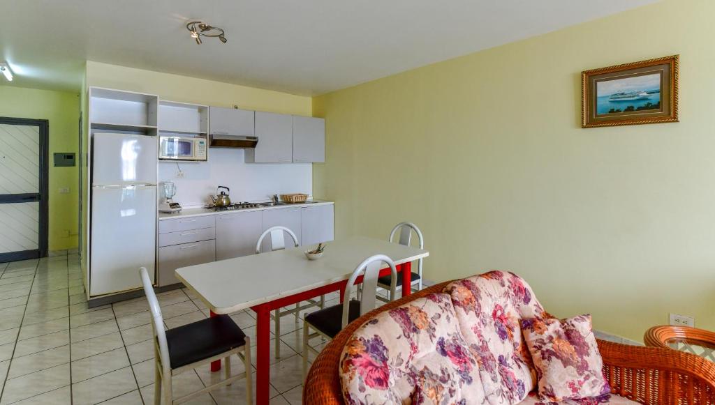 Kuchyň nebo kuchyňský kout v ubytování Heritage Hotel