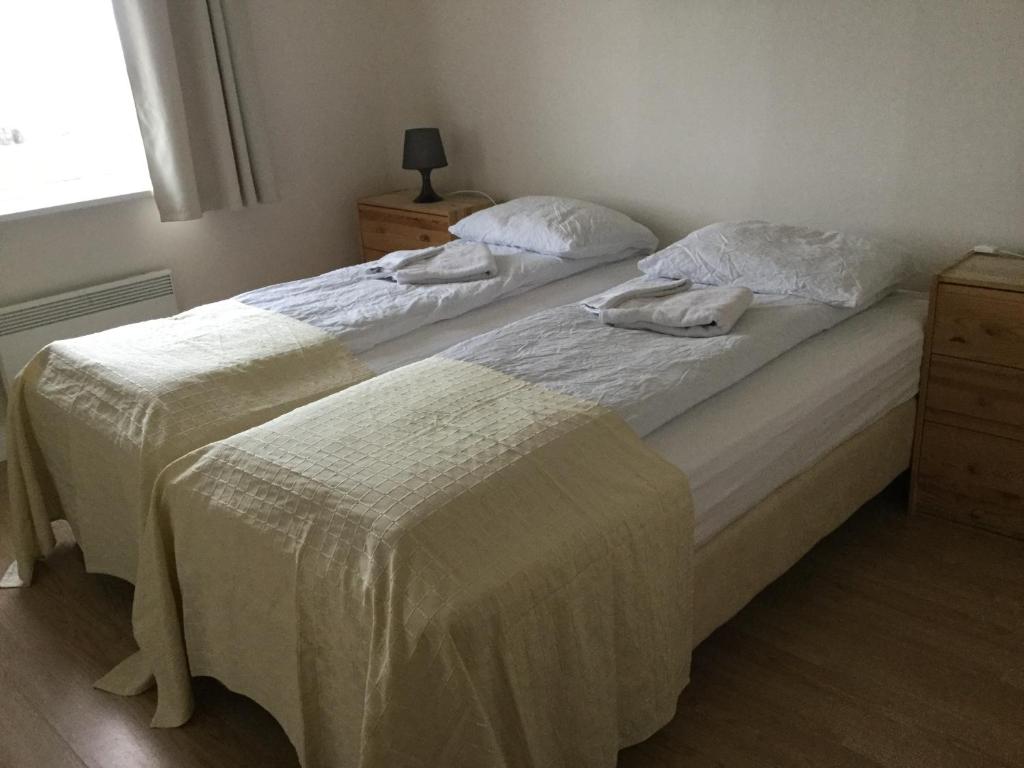 Postel nebo postele na pokoji v ubytování Guesthouse Stekkatún