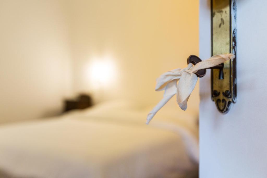 Posteľ alebo postele v izbe v ubytovaní Room En Suite la Corte Assisi