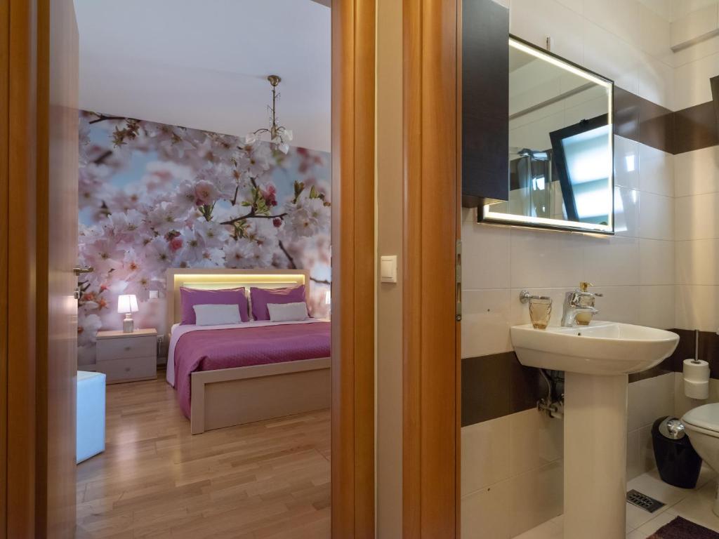 Kúpeľňa v ubytovaní Onyx city Center Apartment With parking