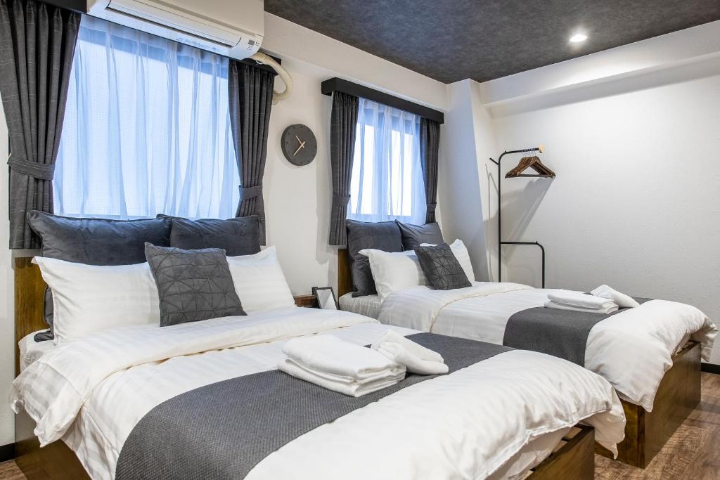 Postel nebo postele na pokoji v ubytování The Park Hotel Akihabara