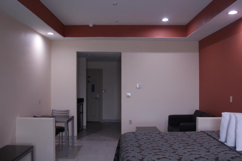 Postel nebo postele na pokoji v ubytování Americas Best Value Inn Port Aransas