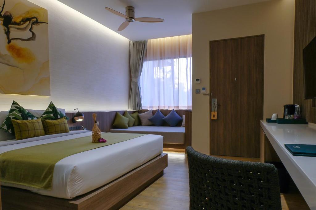 Postel nebo postele na pokoji v ubytování Prana Resort Nandana