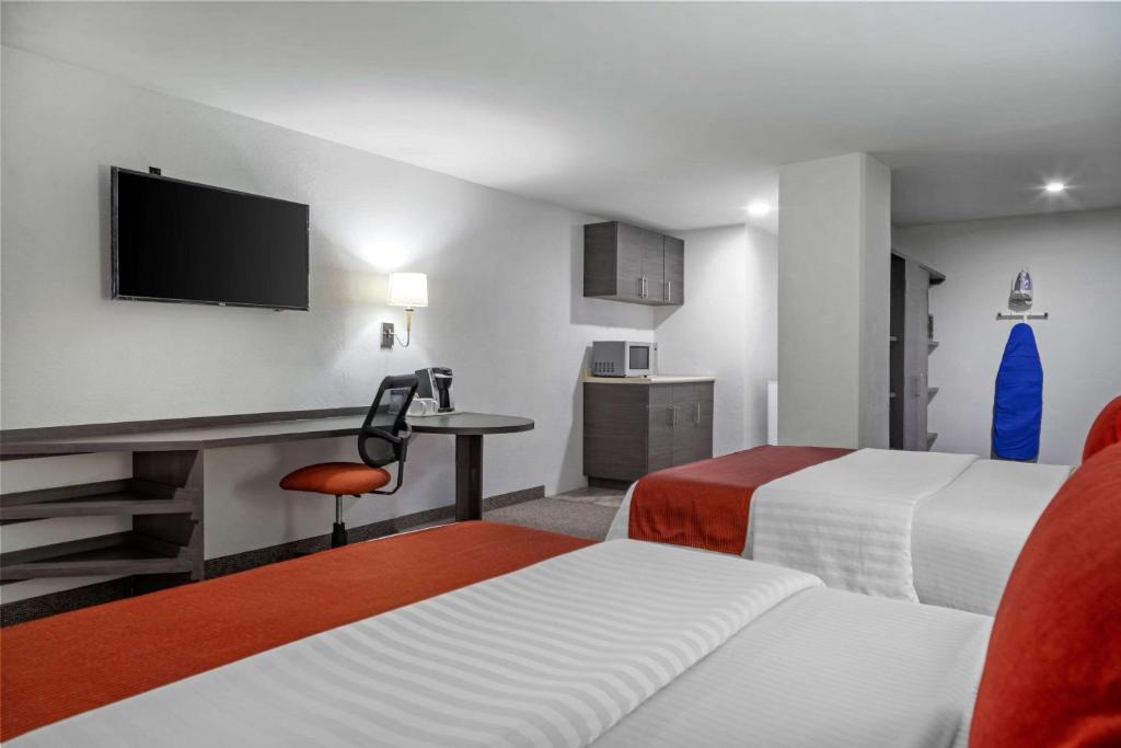 TV a/nebo společenská místnost v ubytování Hotel BeWow Querétaro