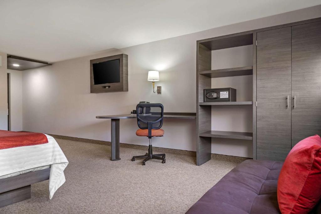 Postel nebo postele na pokoji v ubytování Hotel BeWow Querétaro