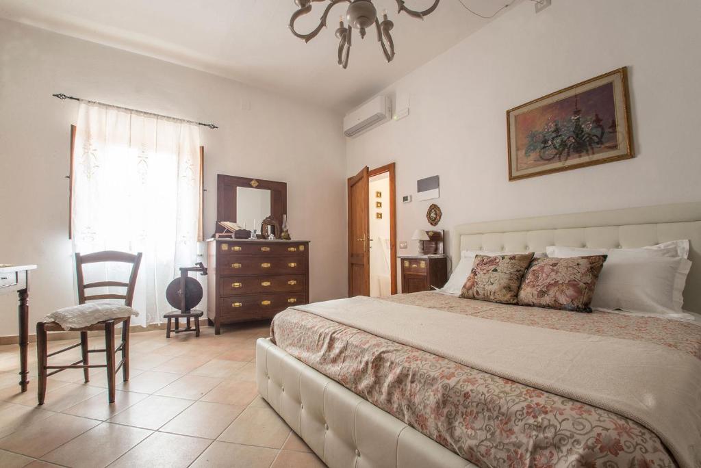 Postel nebo postele na pokoji v ubytování A casa di Irma e Nilo