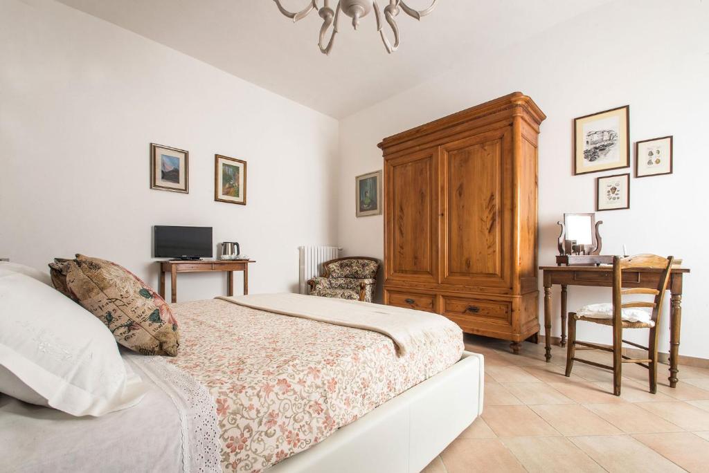 Postel nebo postele na pokoji v ubytování A casa di Irma e Nilo