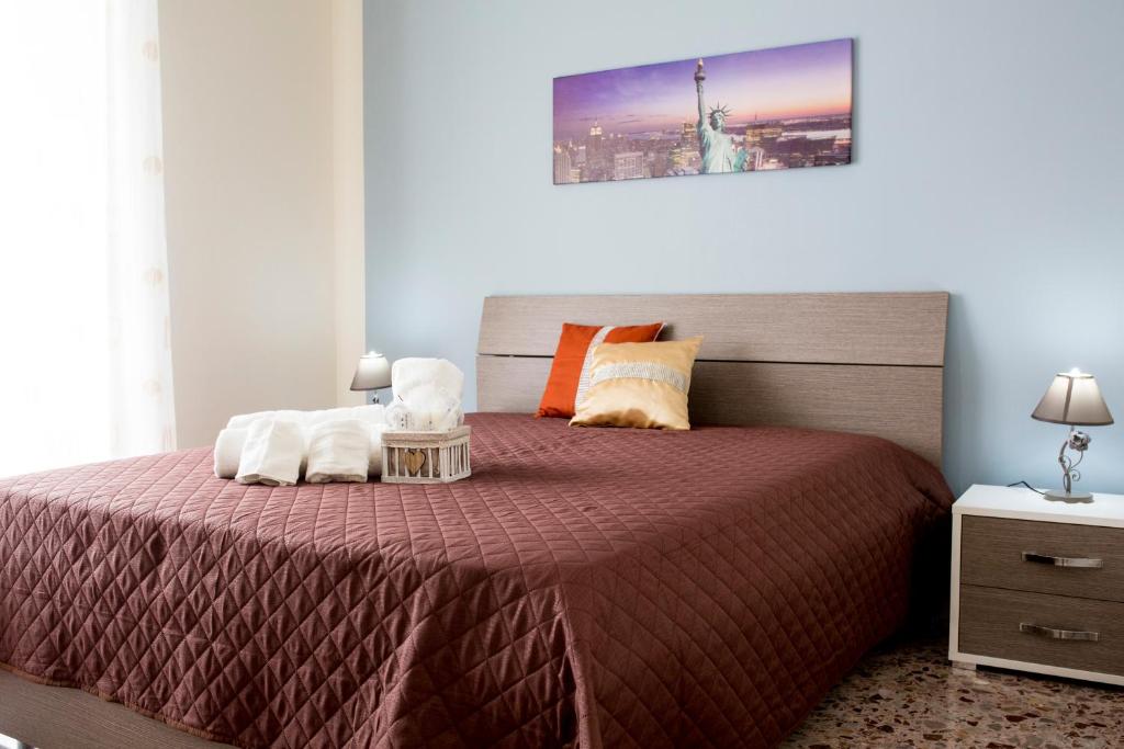 Postel nebo postele na pokoji v ubytování B&B L'Aurora CAPUA