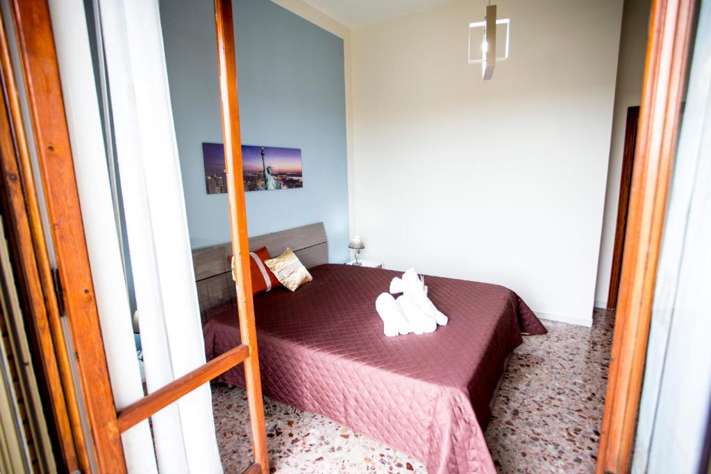 Postel nebo postele na pokoji v ubytování B&B L'Aurora CAPUA