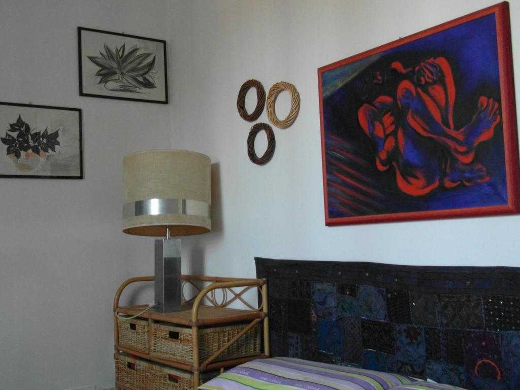 A bed or beds in a room at Abitazione Pigneto B&B