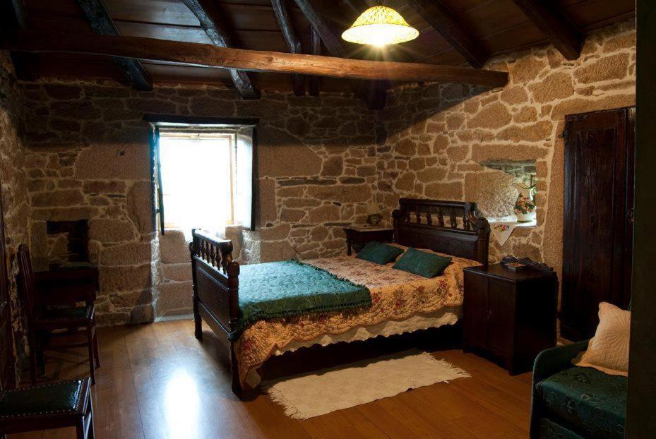 Кровать или кровати в номере Casa Caxigueiro