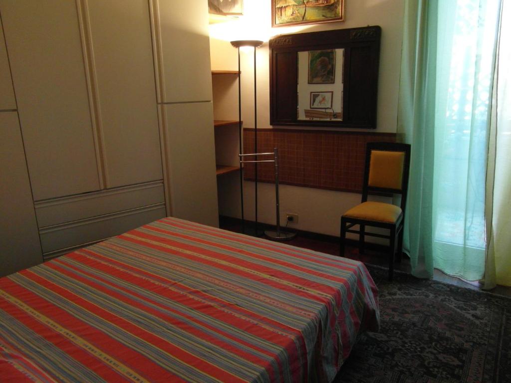 A bed or beds in a room at Abitazione Pigneto B&B