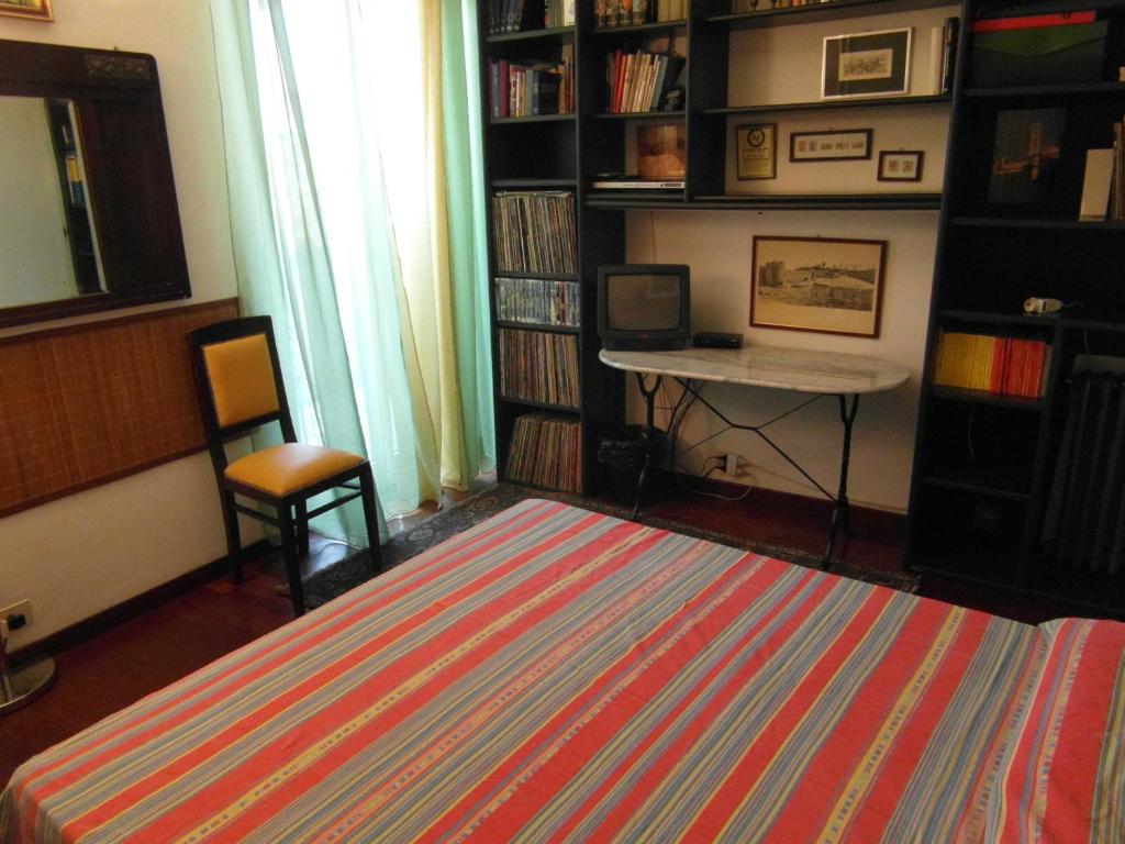 A bed or beds in a room at Abitazione Pigneto B&B