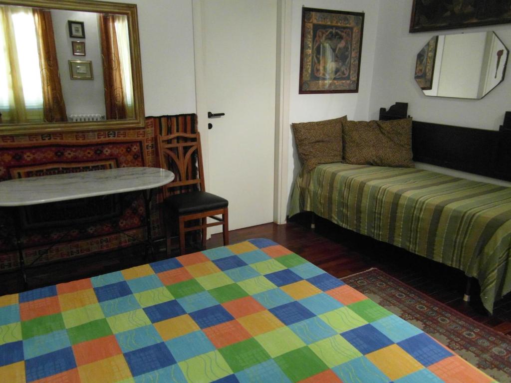 A bed or beds in a room at Abitazione Pigneto B&B