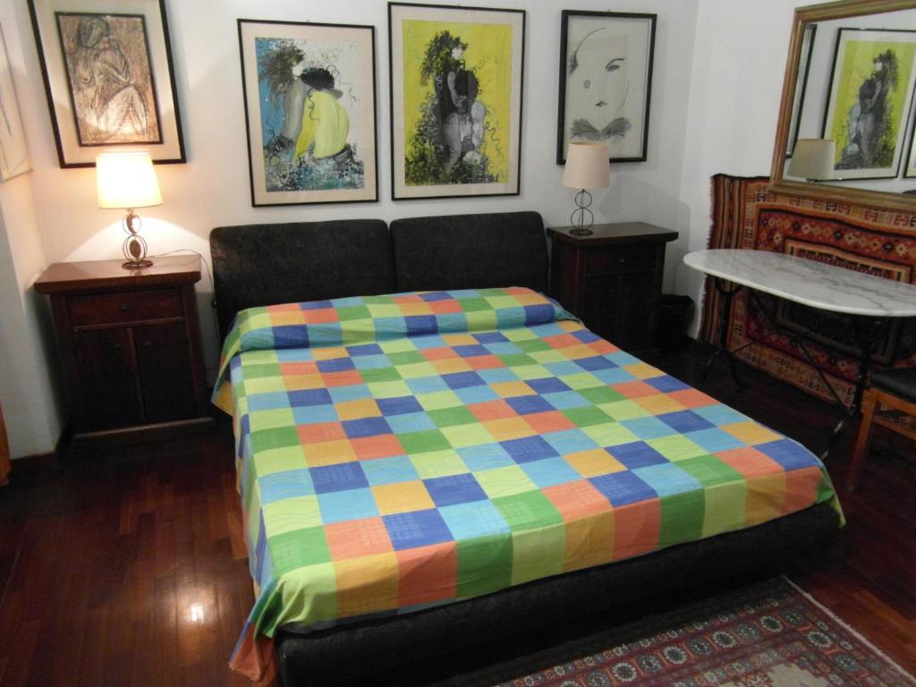 A bed or beds in a room at Abitazione Pigneto B&B